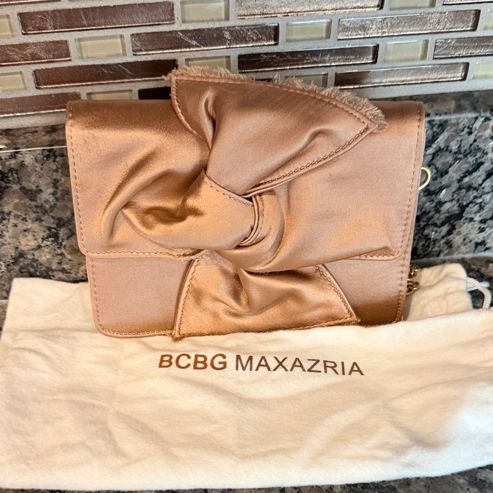 BCBGMaxAzria Rose Gold Satin Knot Clutch